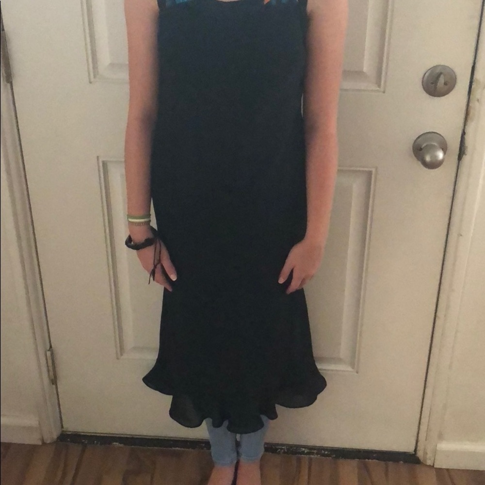 Spaghetti strap black dress.